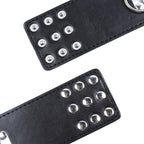 OHMAMA FETISH - HANDGELENKFESSELN MIT DRUCKKNÖPFEN AUS METALL